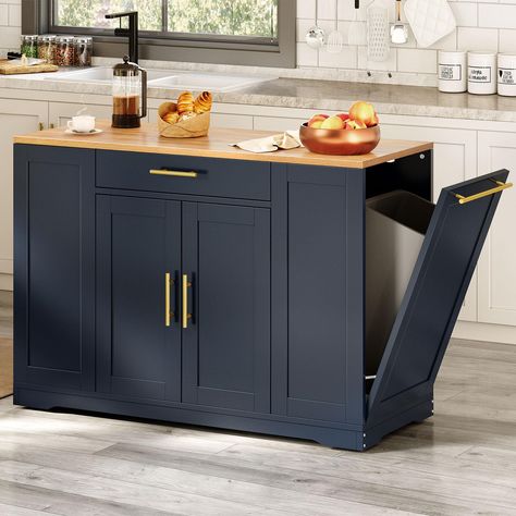 PRICES MAY VARY. No Fabric Tilt Out Trash Can Cabinet - The garbage bin storage cabinet is a great addition to your kitchen island. It can house a 13-gallon trash can (not included), preventing the spread of odors and keeping your kitchen & dining room fresher and cleaner Spacious Storage Space - Including 2 drawers for storing utensils, dinnerware and so on, as well as 3 side open shelves for spices. The height-adjustable shelf inside of cabinet doors accommodates various kitchen items Lockable Kitchen Island With Garbage Storage, Kitchen Island With Garbage Can, Diy Kitchen Island With Trash Storage, Small Kitchen Island With Trash Storage, Moving Kitchen Island, Rolling Kitchen Island Garbage, Kitchen Island With Trash, Multipurpose Kitchen Island, Trash Can Storage