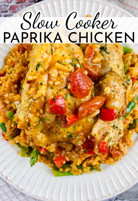 With flavorful rice cooked in the same sauce as the chicken, Slow Cooker Paprika Chicken is a complete and hearty meal! Comfort food is the best kind of food. Chicken Maryland Recipes Slow Cooker, Slow Cooker Chicken And Peppers, Crockpot Paprika Chicken, Crock Pot Paprika Chicken, Slow Cooker Paprika Chicken, Slow Cooker Chicken Paprikash, Paprika Chicken And Rice, Slow Cooker Chicken And Rice Recipes, Chicken Paprikash Slow Cooker