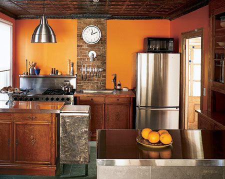 Love the orange of the walls and the exposed brick. #kitchen Burnt Orange Kitchen, Orange Kitchen Walls, Orange Kitchen Decor, Interior Paint Colors Schemes, Craftsman Bungalow, Space Saving Kitchen, Orange Kitchen, Kitchen Colour Schemes, Kitchen Paint Colors