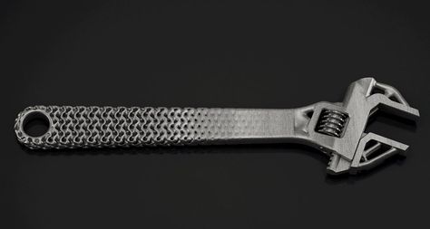 Metal 3D printed wrench demonstrating the blend between lattices and topology optimization. Photo via Frustum Topology Optimization, Lattice Structure, Metal Printing, 3d Printing Business, 3d Printing Industry, Cad Software, Additive Manufacturing, 3d Printed Objects, 3d Printed Metal