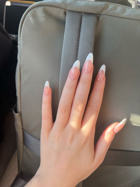 french tip inspo w gems Almond Shaped Nails With Gems, French Tip With Stones Nail Design, Alomd Nails Cute French, Simple Nail Designs With Charms, French Nails With Diamonds Rhinestones, White French Tip With Jewels, French Tip White Almond, French Tip Jewels, French Tip Nails With Crystals