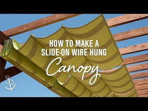 Add extra shade and style to your outdoor living space with a retractable wire-hung canopy system. Our DIY video will walk you through every step. Diy Retractable Pergola Canopy, Diy Shade Canopy, Diy Outdoor Canopy, Pergola Canopy Diy, Slide Wire Canopy, Patio Shade Covers, Cowboy Cottage, Retractable Shade, Backyard Shade