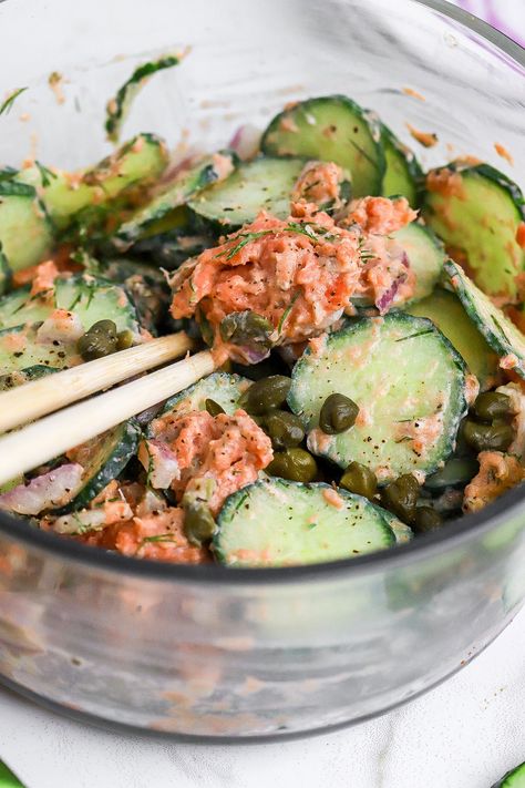 Side view of crisp cucumber salad in a glass container with smoked salmon. Salmon Salad In A Jar, Cucumber Salad Smoked Salmon, Cucumber And Tuna Salad, Spicy Tuna Cucumber Salad, Shaken Cucumber Salad, Cucumber And Salmon Salad, Viral Cucumber Salad With Salmon, Cucumber Salad With Tuna, Cucumber Salad With Salmon