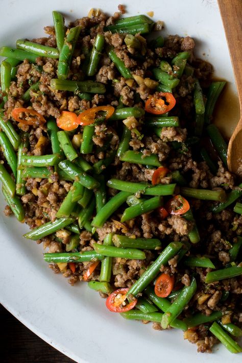 Stir-Fried Green Beans With Pork and Chiles Recipe - NYT Cooking Chinese Green Beans With Pork, Pork With Green Beans, Long Beans Recipe Chinese, Pork And Green Beans Stir Fry, Thai Green Beans Recipe, Traditional Chinese Recipes, Bean Feta Salad, Pork Green Beans, Chinese Green Bean Recipes