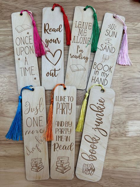 For all the book lovers who need a bookmark that will last for years to come, will not bend, and are unique and fun! Made out of wood and engraved so they will not fade choice of tassle color Wood Engraved Gifts, Wooden Bookmarks, Gift Cards Money, Christmas Craft Fair, Bookmarks For Books, Creative Bookmarks, Laser Engraved Gifts, Bookmark Craft, Laser Engraved Ideas