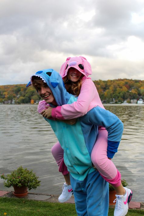 Couples In Onesies, Onesie Halloween Costumes Couple, Stitch And Angel Costume Couple, Couples Costumes Onesies, Couples Onesies Halloween, Onesie Couple Costumes, Cute Matching Onesies For Couples, Onesie Couple Goals, Stitch Onesie Couple