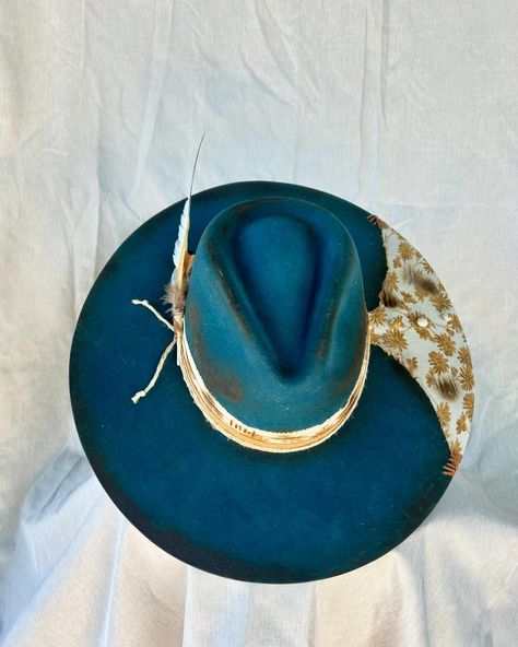 “Gypsy” Custom teal burned flat brim western hat adorned with hand sewn details, twine, buttons, multiple fabrics and feathers. Very good quality cashmere wool felt hat in a beautiful color. One of a kind. Size: 7 1/8 - 7 1/4 $250 https://theroguecowpoke.etsy.com/listing/1807959615 Western Hat, Western Hats, Felt Hat, Hats For Sale, Cashmere Wool, Custom Hats, Hand Sewn, Twine, Wool Felt