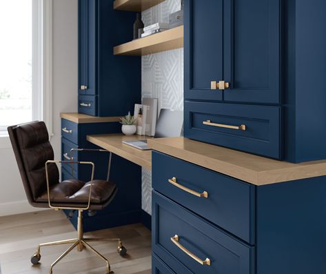 Home Office with Built-In Blue Desk Cabinets - Homecrest Cabinetry Built In Desk With Cabinets And Shelves, Navy Office Cabinets, Navy Blue Office Cabinets, Dark Blue Office Cabinets, Desk Built Into Wall Home Office, Blue Office Cabinets, Home Office Dark Walls, Office Built In Cabinets And Desk, Blue Desks