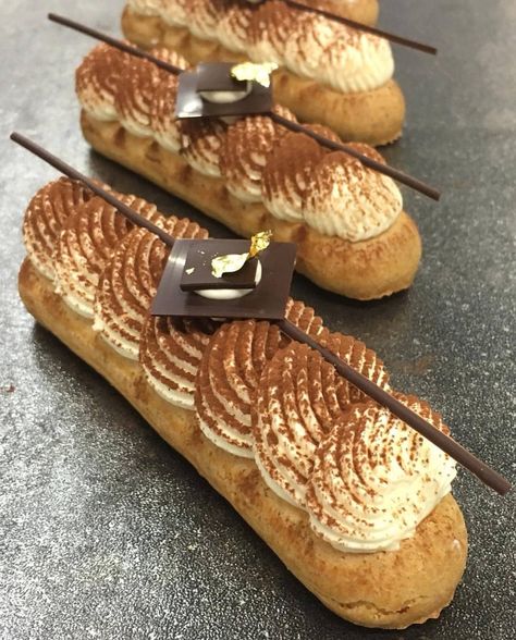 Florent Cantaut on Instagram: “Tiramisu Eclair . . . . . . . #cakeporm #sweetsconsulting #eclair #eclairs #chocolates #chocolatelovers #coffee #italia #italiandessert…” Halloween Eclairs, Eclair Decoration, Eclairs Decoration, Caramel Eclair, Coffee Eclairs, Chocolate Eclairs, Chocolate Eclair, Chocolate Icing, Chocolate Decorations