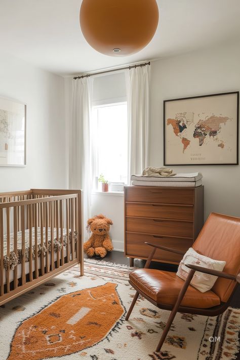 Elegant nursery with natural tones, mixed wood furniture, map accent wall, and cozy rug. Perfect for nursery inspiration and cozy nursery ideas. Nursery Midcentury Modern, Mid Century Modern Nursery Neutral, Mid Century Baby Room, Mid Century Modern Nursery Boy, Mid Century Baby Nursery, Mid Century Modern Baby Nursery, Mid Century Modern Nursery Target, Midcentury Modern Nursery Ideas, Mid Century Nursery Boy