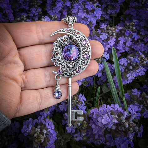 "This handmade fantasy moon key necklace is magical, indeed!  With an artsy crescent moon and high quality Swarovski crystals, this piece of fantasy jewelry will truly make you sparkle.  It would also make an excellent gift for lovers of fairies and magical things! The magical key pendant measures a generous 3\" tall and 1.5\" wide and will come on a silver toned chain in the length of your choice.  If you are unsure what length you need, I can add 2\" of additional chain to make it adjustable.  For example, I could make it 18\" to 20\" adjustable.  Just send me a note along with your order. Each piece is hand made and shipped from the United States in a free complimentary gift box! Thanks for looking and please check this key necklace out with blue crystals necklaces: https://www.etsy.com Magical Jewelry Pendants, Fantasy Jewelry Necklace, Fantasy Key, Fantasy Jewelry Magic, Magical Key, Celestial Witch, Fantasy Moon, Blue Crystal Necklace, Mystical Jewelry