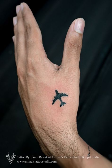 Do you love to travel ? then this plane tattoo is for you #traveling Airplane Hand Tattoo, Travel Tattoo Ideas Men, Basketball Tattoos, Airplane Tattoo, Plane Tattoo, Airplane Tattoos, Animals Tattoo, Small Tattoos For Guys, Hand Tattoos For Guys