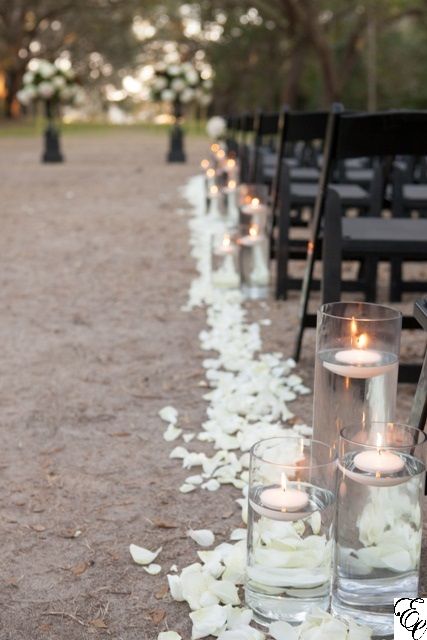 Floating Candles Down The Aisle, Rose Petals Centerpiece Wedding, Candles And Flower Petals Centerpieces, Floating Candles Ceremony Aisle, Ceremony Aisle Candles Outdoor, Rose Petals Ceremony Aisle, Rose Petals Aisle Wedding, Floating Candles Aisle Wedding, White Rose Ceremony Flowers