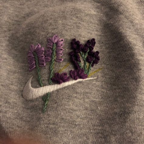 Light Grey Nike Sweatshirt with purple flower embroidery Purple Flower Embroidery, Nike Sweatshirt, Nike Sweatshirts, Grey Nikes, Flower Embroidery, Purple Flower, Embroidery Flowers, Purple Flowers, Light Grey