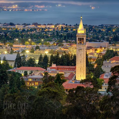 Evening twilight over UC Berkeley (Cal) campus, shot from the Berkeley hills.  I was working an assignment for a website to get this shot, but as luck would have it, this time of year is when the summer fog rolls in over the hills most evenings just after sunset. On five prior attempts, i came away empty handed, that is, unable to see San Francisco on the horizon due to fog, or completely socked in in Berkeley. The unexpected rainstorm Monday night was telling me the clouds might break and th... Berkley University Campus, Uc Berkeley Campus Aesthetic, Uc Berkeley Campus, Uc Berkeley Aesthetic Wallpaper, Berkley University Aesthetic, Berkeley University Aesthetic, Uc Berkeley Aesthetic, Berkeley Aesthetic, Berkley University