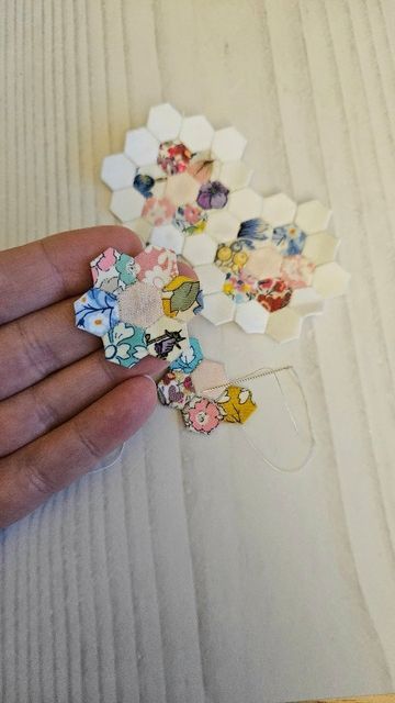 🌺ℝ𝕒𝕔𝕙𝕖𝕝 🌺 on Instagram: "Come and micro patchwork with me! These tiny quarter inch hexies are being made into a tiny grandmothers garden panel. I'm not sure how big it will be yet. it's been sitting in my fabric drawer for 2 years+ so I decided to pull it out today! I started it as a way to use up tiny @libertyquilting scraps. #epp #eppinspiration #micromini #scrappyquilt #scraphexies #scrappypatchwork #englishpaperpiecing #libertyscraps #libertyquilt" Patchwork, Tiny Quilts, Liberty Quilt, Mini Patchwork, Hand Sewing Projects, Scrap Fabric Projects, Miniature Quilts, Scrap Material, Fabric Drawers