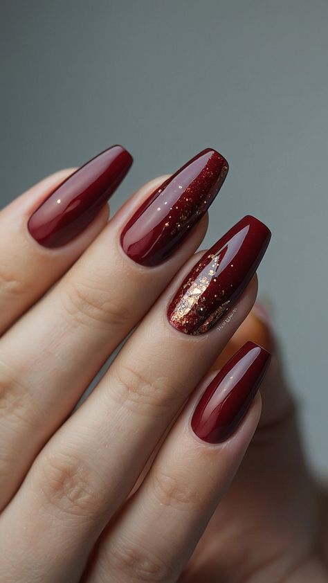 Transform your nails with stunning burgundy designs From dark red to classy black find ideas for art polish French tips and more Discover chic short designs and elegant French tip styles Whether you prefer chrome acrylic or classic polish these burgundy nail designs will elevate your look Cranberry Nails With Gold, Dark Red With Gold Nails, Burgundy Nails Winter, November Red Nails, Dark Red Nails With Gold Design, Deep Red And Gold Nails, Nails Burgundy And Black, Dark Red Design Nails, Dark Red Winter Nails