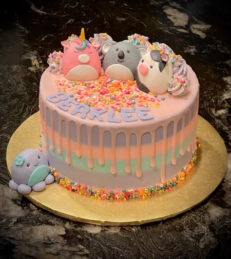 Squishmallow Cake Unicorn Squishmallow Cake, Squishy Birthday Cake, Cake Squishmallow, Fondant Squishmallows, Squishmallow Fondant, Squishmallow Birthday Cupcakes, Squishmallow Cake Tutorial, Squishmallow Sheet Cake, Rainbow Squishmallow Cake