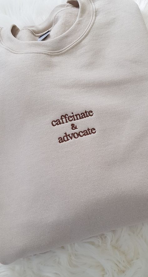 Show off your dedication and passion with our Embroidered Caffeinate And Advocate Awareness Crew. This crewneck sweatshirt is perfect for para professionals, special education teachers, social workers, and anyone who believes in equal rights and social justice. With its bold embroidery and empowering message, this sweatshirt serves as a reminder to stay caffeinated and advocate for important causes. Whether you're in the classroom, the office, or out in the community, this sweatshirt is a stylish way to showcase your commitment to making a difference. It also makes a thoughtful and meaningful gift for the feminist and advocate in your life. Stand up, speak out, and make a statement with this impactful crewneck sweatshirt. Our Gildan sweatshirt is made from a blend of 50% cotton and 50% pol Speak Up, Social Worker Outfits, Events Logo, Sport Events, Special Ed Teacher, Social Worker Gifts, Trendy Crewneck, Crewneck Design, Personalized Logo