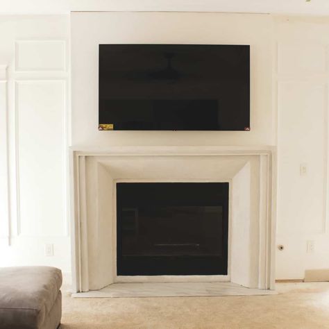 Faux Cast Stone Fireplace, Diy Stone Fireplace Surround, Fireplace Surround Diy, Diy Stone Fireplace, Black Fireplace Surround, Cast Stone Fireplace Surround, Faux Stone Fireplaces, Rotating Tv, Diy Fireplace Mantle