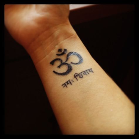 245+ Best Yoga Tattoos Designs and Ideas (2023) - TattoosBoyGirl Om Namah Shivaya Tattoo, Aum Tattoo, Trishul Tattoo Designs, Tattoo On Wrist, Om Tattoo Design, Mantra Tattoo, Tattoos Pictures, Simple Tattoos For Women, Yoga Tattoos