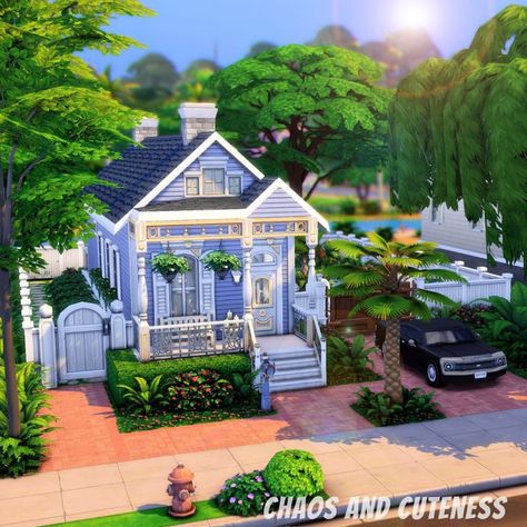 This tiny shotgun was built to represent the world of Willow Creek in episode eight of my "Every World as a Tiny Home" series. It features two bedrooms, one bathroom and an open-concept kitchen/living room. Outside, find a private backyard with a brick patio and pond. Click to check out the speed build. #thesims4 #sims4 #thesims #sims4build #sims4builds #thesims4build #thesims4builds #thesims4house #sims4house #sims4tinyhouse #tinyhome #tinyhouse #shotgunhome #shotgunhouse #chaosandcuteness Living Room Outside, Victorian Exterior, Spring Scenery, Sims Freeplay Houses, Brick Patio, Shotgun House, Private Backyard, Sims 4 House Plans, Sims 4 House Building