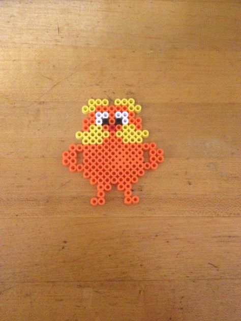 The Lorax Perler beads created by Simspon family for Read Across America Day. Ideas For Melting Beads, Things To Make Out Of Fuse Beads, Melt Bead Designs, Disney Hamma Beads Ideas, Cute Pearled Bead Ideas, Peer Bead Patterns, Pealed Bead Ideas, The Lorax Perler Bead, Things To Make With Melting Beads