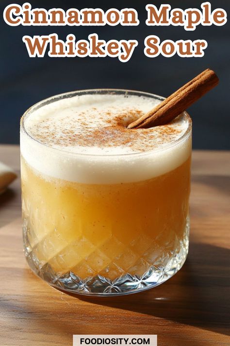 Warm up with the comforting flavors of cinnamon and maple in this unique twist on a classic Whiskey Sour! Perfect for fall and winter, this cocktail combines rich, spicy notes with a smooth, tangy finish. Click to get the full recipe and elevate your cocktail game with this seasonal favorite! Autumn Whiskey Cocktail, Fireball Whiskey Cocktails, Tennessee Whiskey Cocktails, Fall Drinks With Whiskey, Cinnamon Simple Syrup Cocktails, Thanksgiving Whiskey Sour, Winter Whiskey Sour, Lemon Whiskey Cocktail, Maple Drinks Cocktails