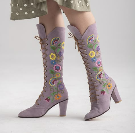 "The most beautiful handmade suede embroidered boots in the 1960s Jerry Edouard vintage \"Almost Famous\" style. In a beautiful lavender color. Has a scroll of embroidered flowers and leaves made of multicolored orange, yellow, blue, green, purple, and pink thread on both sides of the boot. Have blue and yellow beading on the flowers. Lace all the way up in fine chrome eyes and hooks. Tapered toe and Cuban heel. Our own label. These have braided laces, padded insoles for comfort, and an all-leat Lavender Boots Outfit, Boots Embroidered, Yellow Green Outfit, Fairy Boots, Lavender Clothes, Lavender Boots, Floral Embroidered Boots, 1960s Boots, Jerry Edouard Boots