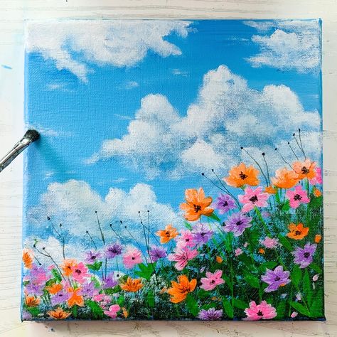 Acrylic painting on canvas with bright blue sky and colourful spring flowers. Painting Of A Field Of Flowers, Cloud Painting Ideas On Canvas, Flower Paiting Aesthetic, Landscape Paintings Flower Field, Painting Acrylic Easy Simple, Sky With Flowers Painting, Natural Painting Easy, Drawing With Acrylic Paint Ideas Nature Easy, Canvas Art Painting Flowers