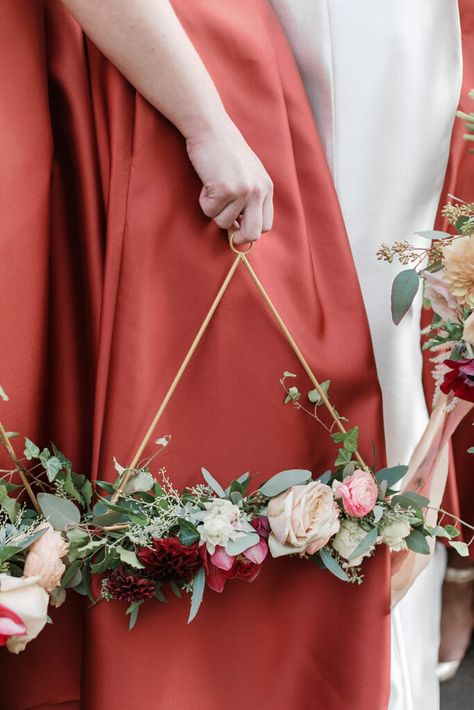 I am sharing the bouquet recipe for creating these unique triangle bridesmaid’s bouquets with fall flowers including burgundy Dahlias! I had the pleasure of creating unique wedding bouquets with gold triangle hoops for the bridesmaids at Kate’s beautiful burgundy fall wedding, inspired by her love for music. Triangle Bridesmaid Bouquet, Unique Bridesmaids Bouquets, Alternate Bridesmaid Bouquet, Unique Bridesmaid Bouquet Ideas, Ring Bouquet Bridesmaid, Bridesmaid Hoop Bouquet, Alternative Bouquet Ideas, Unique Bridesmaid Bouquet, Bridesmade Bouquet