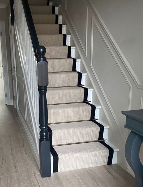 Stair runners are often MUCH cheaper then a full carpet on the staircase and when paired with cast iron rods, add a beautiful Victorian London look! An essential cheap upgrade for upstairs flats! Hallway With Stair Runner, Pine Staircase Makeover, Stair Runner Black Trim, Stair Runner Bars, Hallway Bannister Ideas, Staircase Makeover With Runner, Classic Stair Runner, Black And White Stairs With Runner, Stairs With Runner Carpet