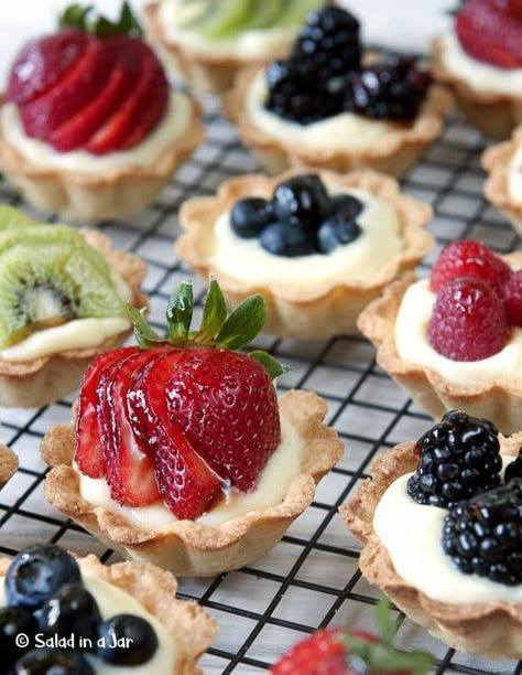 Party-perfect individual fresh fruit mini-tarts with a simple custard filling. #desserts #fruittarts #freshfruit #shortbreadcrust #showers #weddingfood Fruit And Cream, Parmesan Orzo, Mini Fruit Tarts, Fruit Tart Recipe, Mini Tarts, Fruit Cream, Fruit Tarts, Fresh Fruit Recipes, Creamy Parmesan