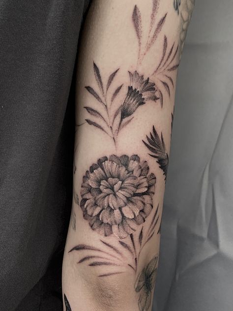 Marigold flower tattoo One of the hardest flowers to Execute in my style By Faisal Al-lami @tattoo.sal  ——- #dallastattooartist #dallastattoos #art #drawing #inked #blackandgreytattoo #dfwtattoos #sleevetattoo #marigold #marigoldtattoo #floraltattoo #flowertattoo #dallasyoga #dallasfitness #microrealism Black And Grey Marigold Tattoo, Marigold Black And White Tattoo, Marigold Flowers Tattoo, Marigold Tattoo Design Black And White, Black And White Marigold Tattoo, Mexican Marigold Tattoo, Mary Gold Flower Tattoo, Marigold Flower Tattoo Black And White, Marigold Tattoo Black And White