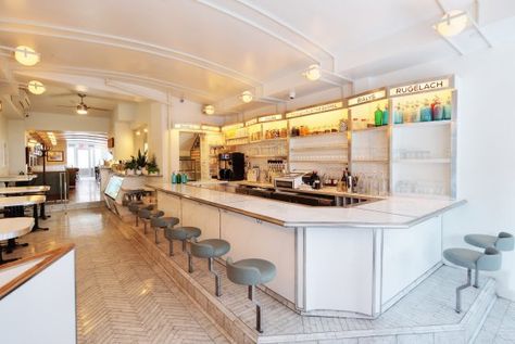 the baked-enamel counter and the herringbone-patterned marble floor. Russ And Daughters Nyc, Nyc Spots, Russ And Daughters, Brunch Cafe, Art Deco Elements, New York Food, Cafe Kitchen, Small Bar, Smoked Fish