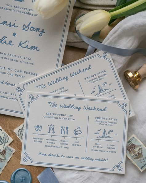 M+E’s precious invitations for their French coastal wedding featuring a letterpress print, custom venue illustration printed on vellum, and handdrawn illustrations of the couple and weekend timeline activities. We love how the antique label holder and baby blue satin ribbon tie all the elements together for a whimsical, one of a kind finish. 💙🛥️ . . . . . . . . #luxuryweddingstationery #luxuryweddinginvitations #customweddingstationery #customweddingdesign #classicwedding #minimalwedding #ele... Classic Coastal Wedding, French Invitation, Timeline Activities, Blue Wedding Invitation Suite, Wedding Invitations Ribbon, Coastal Illustration, Wedding Invite Ribbon, Ribbon Wedding Invitations, Coastal Wedding Invitation Suite