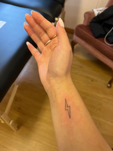 Minimalist Lightning Bolt Tattoo, Lightning Bolt Wrist Tattoo, Lighting Bolt Tattoo Meaning, Lighting Bolt Tattoo Women, Ride The Lightning Tattoo, Harry Potter Lightning Bolt Tattoo, Lighting Bolts Tattoos, Lightnight Bolt Tattoo, Thunder Bolt Tattoo