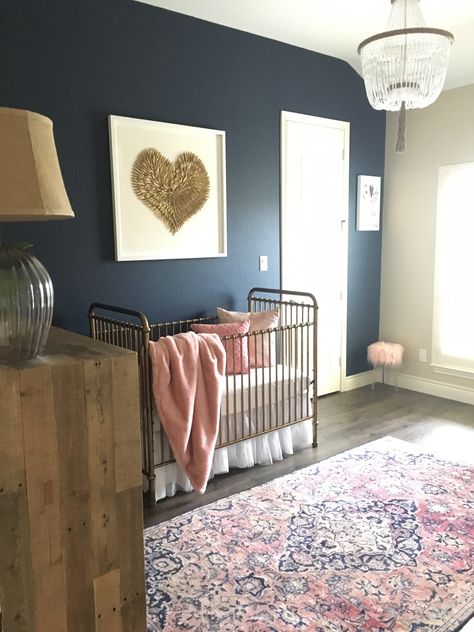 Navy and blush nursery with gold crib, gold feathered heart wall art and vintage Persian rug. Navy Star Nursery, Navy And Mauve Nursery, Navy Wall Accent, Navy Wall Nursery, Navy Blush Nursery, Pink And Navy Blue Nursery, Extravagant Nursery, Navy Blue Nursery Girl, Navy Walls Nursery