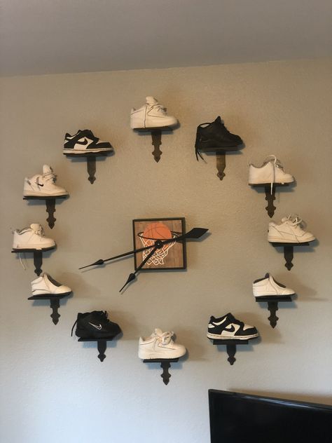 I have created a new look for my 15 yr old son’s room. Saving several of his favorite Nikes I wanted to use them to display and not sit in a box. So here is the clock! Motocross Room, Photowall Ideas, Shoe Store Design, Sneaker Displays, Future Son, Shoe Wall, Retail Store Interior, Interior Display, Sneaker Stores