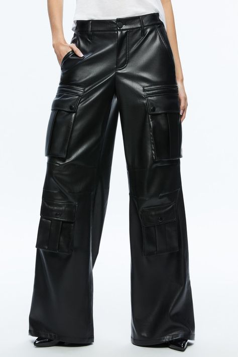 Find ALICE + OLIVIA Joette Vegan Leather Cargo Pant on Editorialist. Description One of our favorite silhouettes of all time, in chic vegan leather. With a wide straight leg, cargo design and easy fit this takes a classic to a whole new level. Details Cargo pants Full length Vegan leather Low rise Elastic waistband Front button and zipper closure 100% polyester Dry clean only Imported Fit Front rise: 9 1/2 Back rise: 14 3/4 Inseam: 34 1/2 Fits true to size, take your normal size Model is wearing a size 25 and her measurements are 59.5, 31 bust, 23 waist, 34.5 hip Low Waisted Leather Pants, Cargo Pants With Sneakers, Best Cargo Pants, Leather Cargo Pants, Vegan Leather Midi Skirt, Royal Au, Cargo Design, Oc Reference, Latest Designer Dresses