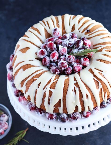 Orange Cranberry Cake Bundt, Orange Cranberry Bundt Cake, Easy Orange Desserts, Wreath Bundt Cake, Cranberry Orange Bundt Cake Recipe, Christmas Bundt Cake Recipes, Orange Bundt Cake Recipe, Cranberry Orange Bundt Cake, Boozy Cakes