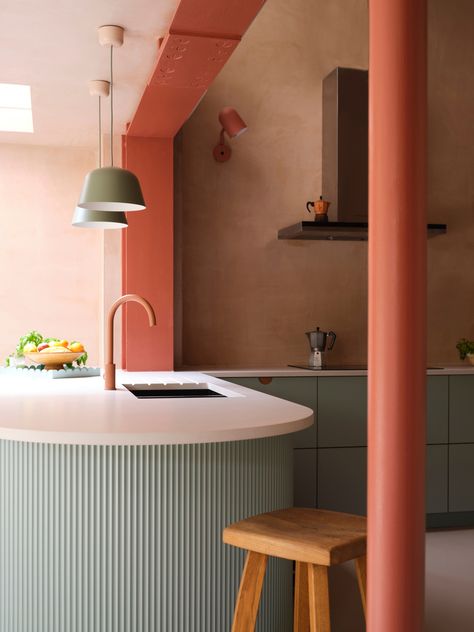 The Peninsular worktop in this Stoke Newington kitchen offers the homeowner the best of both worlds; a practical physical divide between spaces, but the open vista keeps it social and connected. American Red Elm on the taller corner cabinets is mirrored in the low bench seating to unite the space seamlessly creating a zone for reading, playing or socialising. Exposed Metal Beams, Breakfast London, Tall Corner Cabinet, Kitchen Colour Combination, Christmas Colour Schemes, Metal Beam, Kitchen System, Ikea Cabinets, Christmas Color