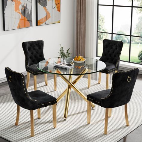 PRICES MAY VARY. ★【Modern 5-Piece Glass Dining Table Set for 4】 This 5pcs round dining room table set includes 1 Glass kitchen table and 4 upholstered velvet dinner chairs. With a minimalist look and luxury modern design, this beautiful circle Glass dinner table set will fit perfectly with a wide array of home decor. ★【35.43" Glass Top Kitchen Table with Shiny 3 Cross Metal Legs】The base of this large dining table is made of quality metal and polished shiny finish. Which makes this table unique Black And Gold Dining Room, Rectangle Glass Dining Table, Glass Dinning Table, Glass Dining Room Sets, Long Dining Room Tables, Dinner Chairs, Round Glass Dining Table, Glass Kitchen Tables, Dinning Table Set