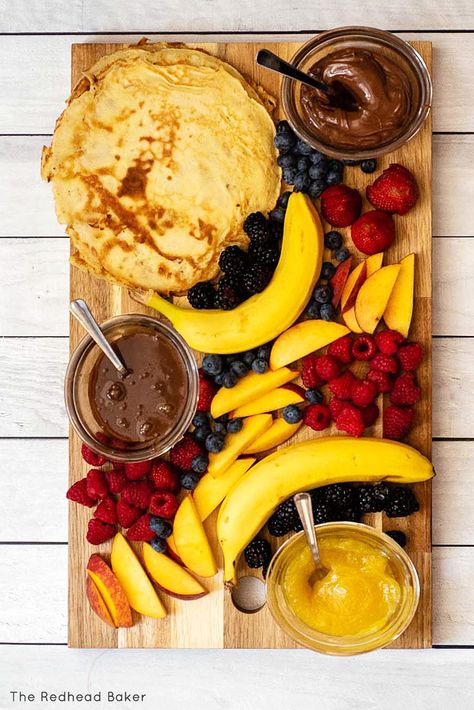 Move over, cheese board! Meet the crepe board! Use this easy recipe for homemade French crepes and fill your board with all the fillings: fruit, Nutella, lemon curd, and caramel! Crepe Charcuterie Board, Crepe Fruit Filling, Caramel Apple Crepes, Nutella And Banana Crepes, Crepes With Nutella And Strawberries, Crepe Bar, French Crepe Recipe, French Crepes, Trifle Pudding