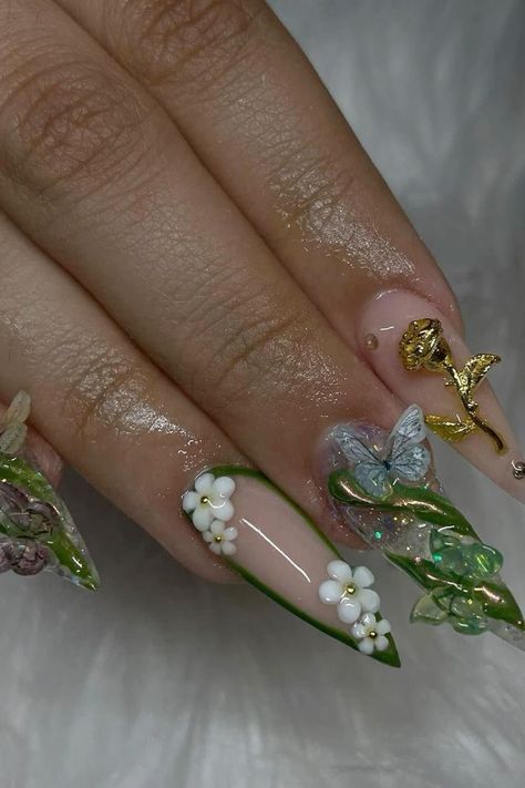 nail art Green Theme Nails Acrylic, Nails 3d Butterfly, Nails With Embellishments, Green And Gold Butterfly Nails, Chrome Fairy Nails, Butterfly Garden Nails, Green Acrylic Nails With Butterflies, Cottagecore Aesthetic Nails, 3d Stiletto Nails