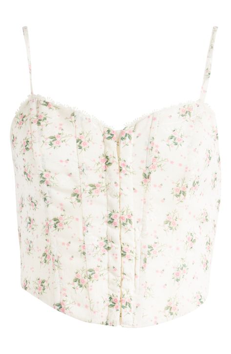 A romantic floral print covers this corset-inspired camisole detailed with structured boning and lacy trim at the neckline for an added touch of charm. 10 1/2" center front length (size Medium) Front hook-and-eye closure Sweetheart neck Lined Adjustable straps 100% polyester Hand wash, line dry Imported Lacy Corset Outfit, Pink Corset Outfit, Benson Boone, Lace Corset Top, Romantic Floral Print, Pink Floral Top, Corset Outfit, Pink Corset, Floral Corset