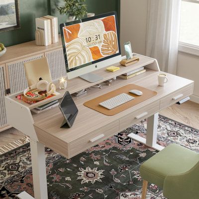 Upgrade your workspace with our modern light walnut electric standing desk. Featuring MCM style, large storage space, ergonomic monitor shelves, and adjustable height, it offers both style and functionality for a productive work environment. | Modern Light Electric Standing Desk MCM Style Large Storage Adjustable Height in Brown / White Accentuations by Manhattan Comfort | Wayfair Corner Standing Desk, Smart Desk, Mcm Style, Classic Desk, Electric Standing Desk, Adjustable Height Standing Desk, Stand Up Desk, Office Room Decor, Adjustable Standing Desk