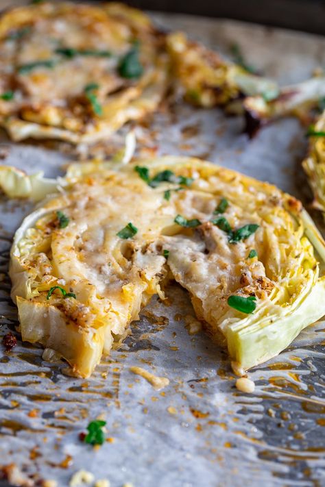 These Roasted Cheesy Cabbage Steaks make the most delicious side dish and you'll LOVE how easy they are to make. It's a dish that feels fancy but is super simple! Fancy Side Dishes For Steak, Parmesan Crusted Cabbage Slices, Cheesy Baked Cabbage Wedges, Cheesy Cabbage Steaks, Roasted Garlic Parmesan Cabbage, Roasted Garlic Cabbage Wedges, Cheesy Baked Cabbage Steaks 12 Tomatoes, Baked Cabbage Steaks, Cheesy Cabbage