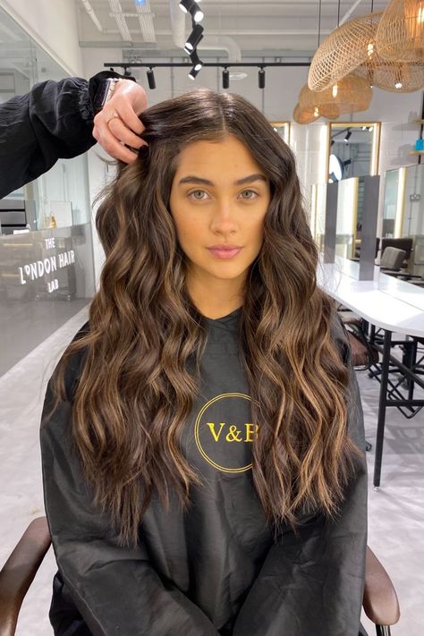 Highlighted Brunette hair in London salon Glossy Brunette Balayage, Natural Balayage Hair Brunette, Hair Extensions Long Brown, Brunette Hair Before And After, Lifted Brown Hair, Before And After Brunette Balayage, Long Brown Hair With Extensions, Virgin Brunette Hair, Enhanced Brunette Hair