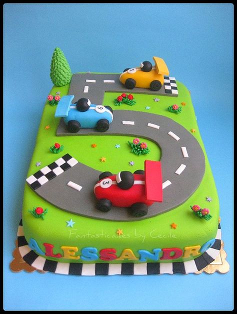 We did this cake for my Grandson last year with Cars the Movie toy vehicles on it. He loved playing with them latter :-) Lightning Mcqueen Birthday Cake, Disney Themed Cakes, Race Car Cakes, Disney Birthday Cakes, Car Cake, Boy Birthday Cake, Cake Designs Birthday, Cakes For Boys, Birthday Cake Kids